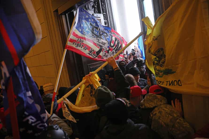 Donald Trump supporters break into the US Capitol building on 6 January.