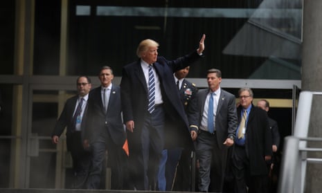 Donald Trump waves as he leaves CIA headquarters in Langley, Virginia on 21 January 2017.