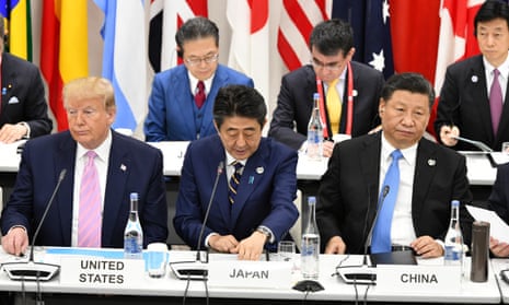 US President Donald Trump, Japanese Prime Minister Shinzo Abe and Chinese President Xi Jinping during an event on the sidelines of the G20 summit in Osaka, Japan, 28 June 2019. Trump and Xi are due to meet on Saturday to discuss the deadlock on trade