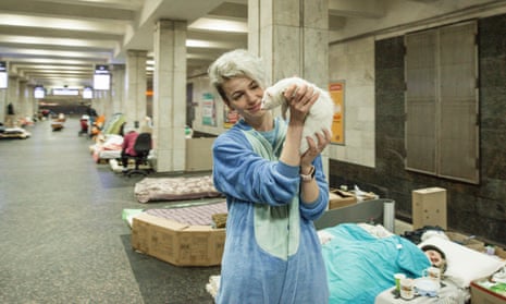 Dascha with her ferret Dracoa in Kharkiv metro.