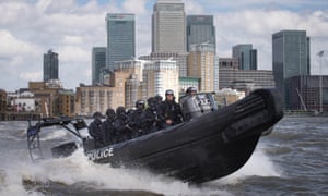 Armed Metropolitan police counter terrorism officers during an exercise on the Thames.