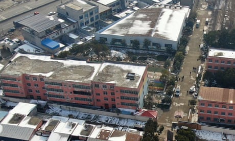 A drone image of the dormitory with charred windows  at Yingcai school in Dushu, Henan province