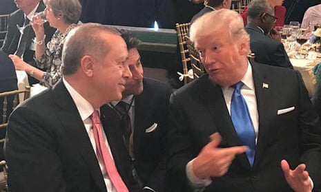 Recep Tayyip Erdoğan listens to Donald Trump during a dinner at UN headquarters.