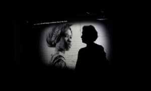 A visitor watches a video presentation at James Madison’s Montpelier in Orange county, Virginia.