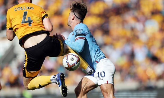 Erling Haaland on target again as Manchester City punish 10-man Wolves | Premier League 3 Wolves’ Nathan Collins flies into a rash challenge on Jack Grealish.