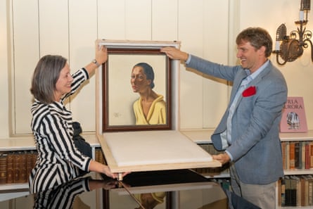 People hold up portrait