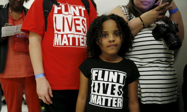 Mari Copeny, eight, of Flint, Michigan, waits in line to enter the hearing room on Capitol Hill.