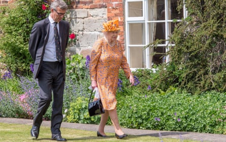 Queen Elizabeth II with Nathan Thompson, the chief executive of the Duchy of Lancaster estate
