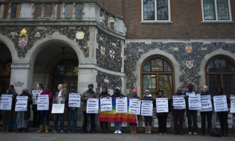 Members of the LGBT community stage a peaceful protest outside Church House in London before a crucial vote by the clergy on same-sex relationships.