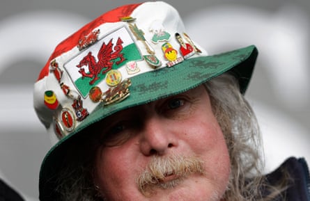 A Cardiff fan wearing his Welsh bucket hat with badges on during the Swansea City v Cardiff City EFL Championship match in October 2022.