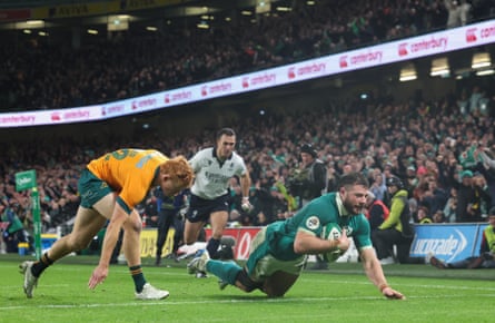 Tane Edmed can’t stop Ireland’s Robbie Henshaw of Ireland from scoring a try