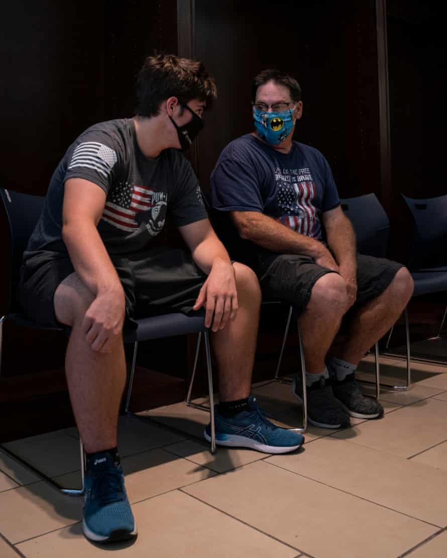 Nathaniel Bynum, 17, left, received the Covid vaccine at La Palmera Mall in Corpus Christi.