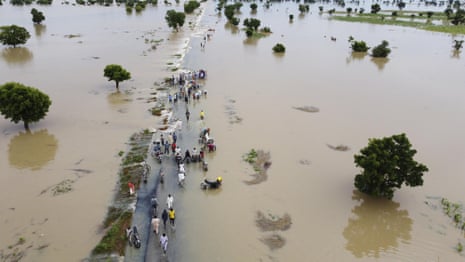 'Like something you watch in a movie': climate crisis intensifies with catastrophic floods – video