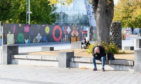 A homeless man is seen at Cathedral Square in Christchurch, New Zealand