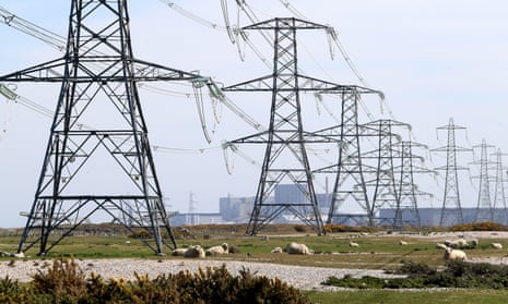 A photo of electricity pylons carrying power away from Dungeness nuclear power station in Kent.