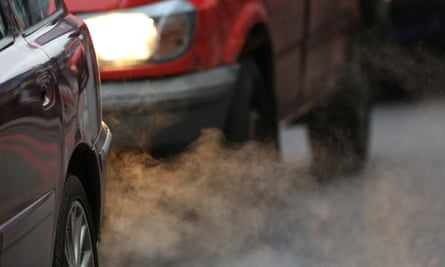 Exhaust fumes from a car in Putney High Street in south London.
