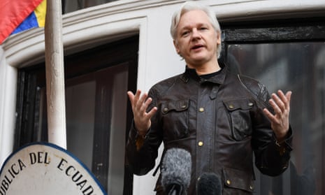 Julian Assange in dark leather jacket