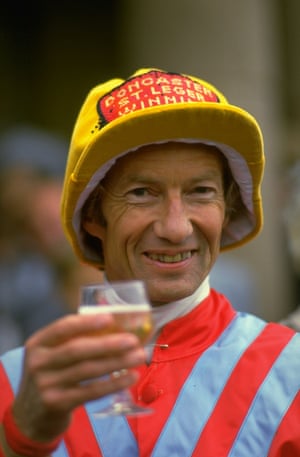 Piggott celebrates after winning the 1984 St Leger on Commanche Run at Doncaster racecourse, which broke the all time Classic winning record, with Piggott achieving his 28th Classic victory.