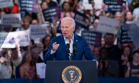 Biden in blue suit jacket and shirt