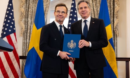 Ulf Kristersson, left, and Antony Blinken at a ceremony formalising Sweden joining Nato in Washington DC