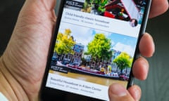 Airbnb holiday room booking app showing house boat in Amsterdam for rent on an iPhone 6 plus smart phone<br>FDTR7J Airbnb holiday room booking app showing house boat in Amsterdam for rent on an iPhone 6 plus smart phone
