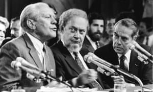 The supreme court nominee Robert Bork (centre) is introduced by President Gerald Ford (left) and Senator Robert Dole at confirmation hearings in 1987.