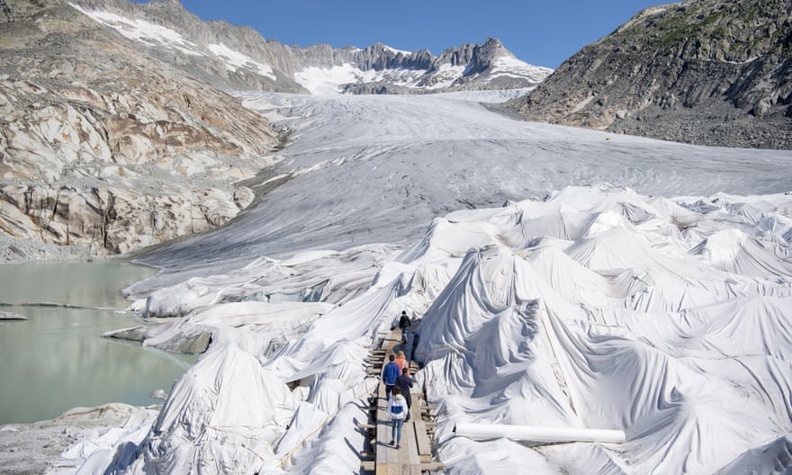 Under wraps: parts of the Rhone glacier are covered in blankets above Gletsch near the Furkapass to prevent it from melting so quickly.