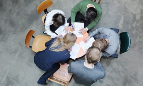 Overhead view of business people at desk