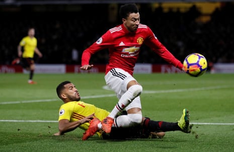 Adrian Mariappa challenges Jesse Lingard.