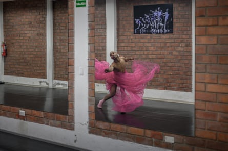 Ballet dancer Juan Pablo Rodriguez photographed in a flowing pink skirt