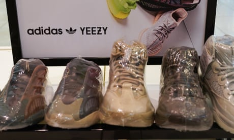A sign advertises Yeezy shoes made by Adidas at Kickclusive, a sneaker resale store, in Paramus, N.J., Tuesday, Oct. 25, 2022. Adidas has ended its partnership with the rapper formerly known as Kanye West over his offensive and antisemitic remarks, the latest company to cut ties with Ye and a decision that the German sportswear company said would hit its bottom line. (AP Photo/Seth Wenig)