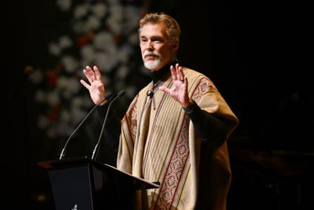 John Easterling speaks during the state memorial service for Olivia Newton-John in Melbourne.