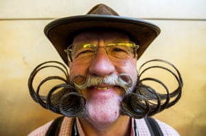 A contestant of the World Beard And Mustache Championships poses for a picture during the Championships