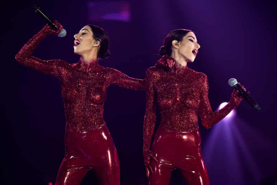 The Veronicas perform in latex pants and glitter body paint to open the 30th annual Aria awards at The Star, in Sydney on Wednesday.