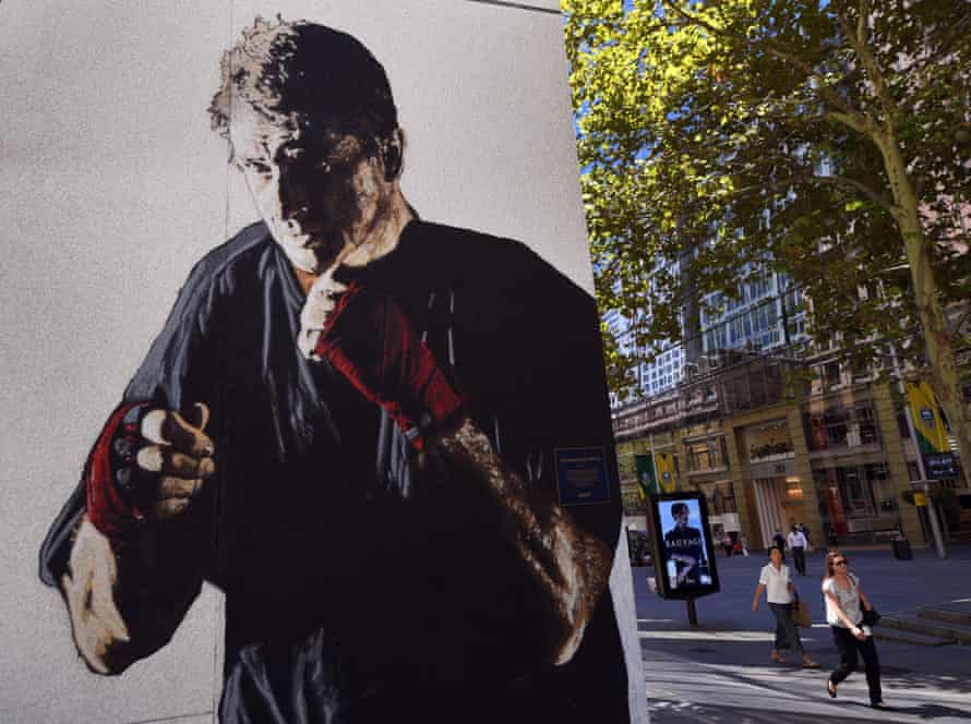 A portrait of Father Dave Smith by the artist E.L.K adorned the side of a building in Sydney’s Martin Place.