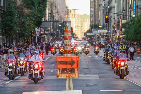 NYPD officers escort the presidential motorcade outside of Madison Square Garden ahead of Game 3.