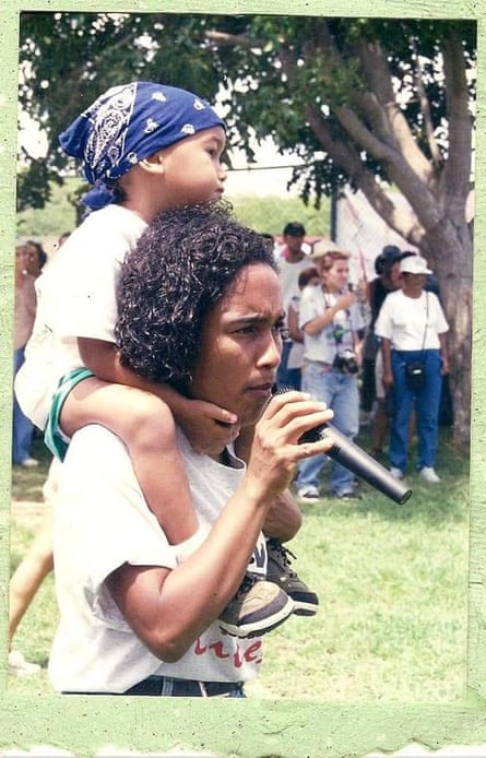 woman with kid on shoulders