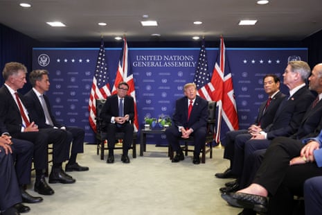 Andy Burnam with Donald Trump, and their advisers, at the UN.