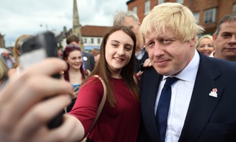 Boris Johnson stops for a selfie with a voter in Selby, North Yorkshire.