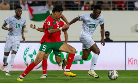 Nayef Aguerd and Patson Daka challenge for the ball