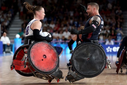 Sarah Adam collides with Stuart Robinson during their wheelchair rugby semi-final.