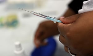 A Johnson and Johnson booster vaccine is prepared in Cape Town, South Africa.