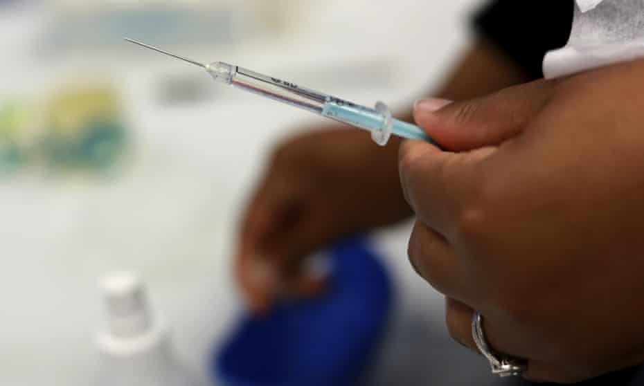 Vaccination doses being prepared at the Cape Town International Convention Centre, South Africa, on 30 November.