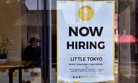 A hiring sign in Los Angeles. Non-farm payrolls increased by 943,000 jobs last month after rising 938,000 in June.