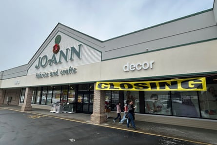 people walking outside a store