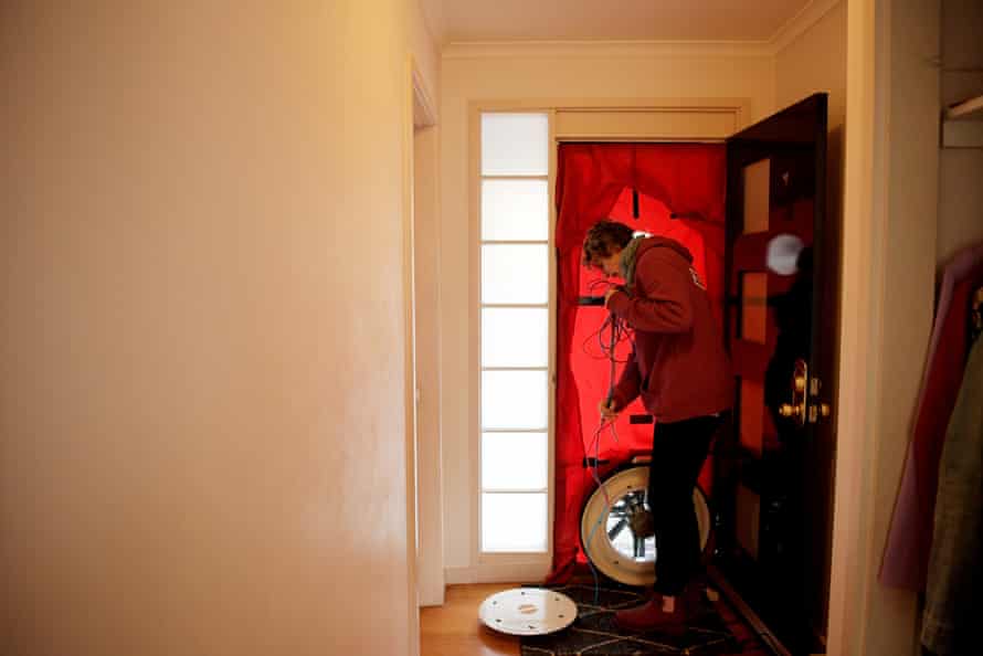 Staff setting up a blower door