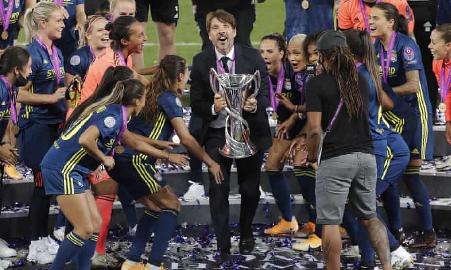 Jean-Luc Vasseur holds the Women’s Champions League trophy after leading Lyon to victory over Wolfsburg in the 2020 final.