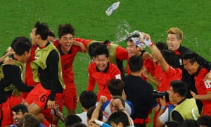 Scenes at the final whistle as South Korea qualify.