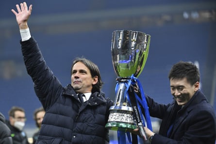 Simone Inzaghi with Inter chairman Steven Zhang and the trophy.