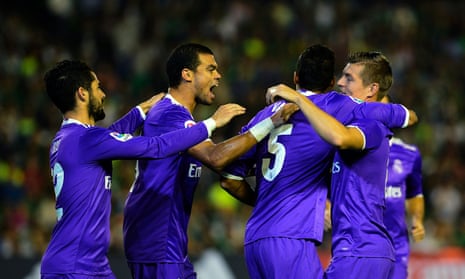 Raphael Varane (second right) celebrates after opening the scoring for Real Madrid.